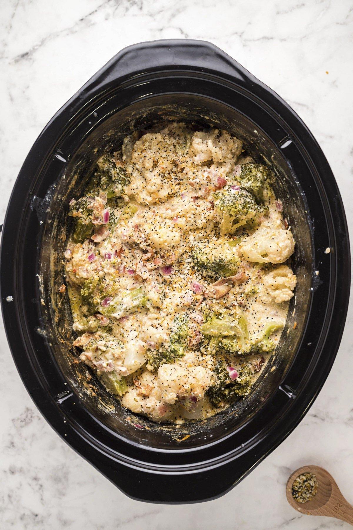 cooked cauliflower and broccoli casserole in slow cooker