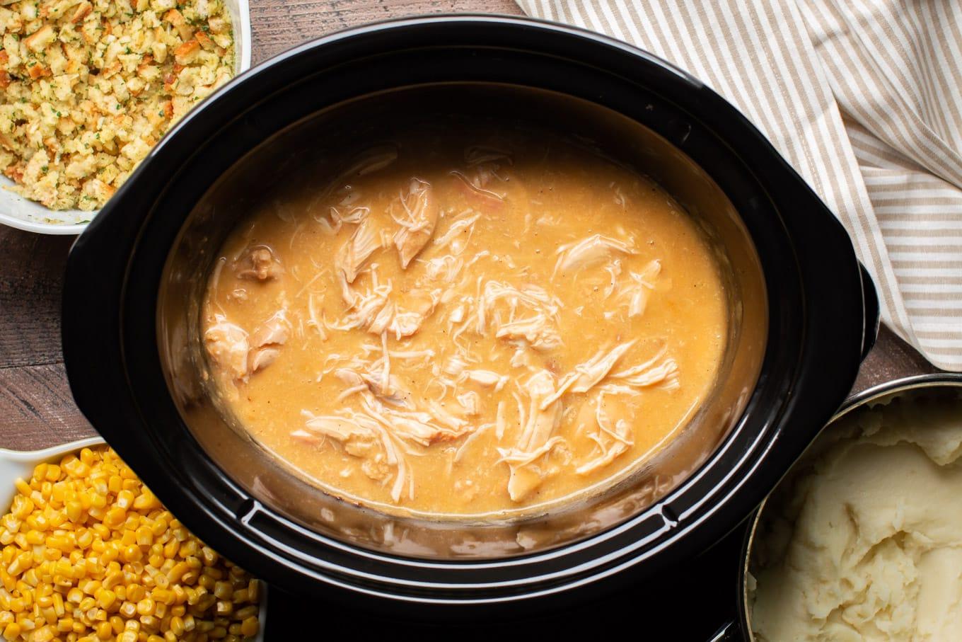 Cene Slow Cooker per il Rientro a Scuola 3 Slow Cooker piena per 1/3 di sugo e pollo sfilacciato