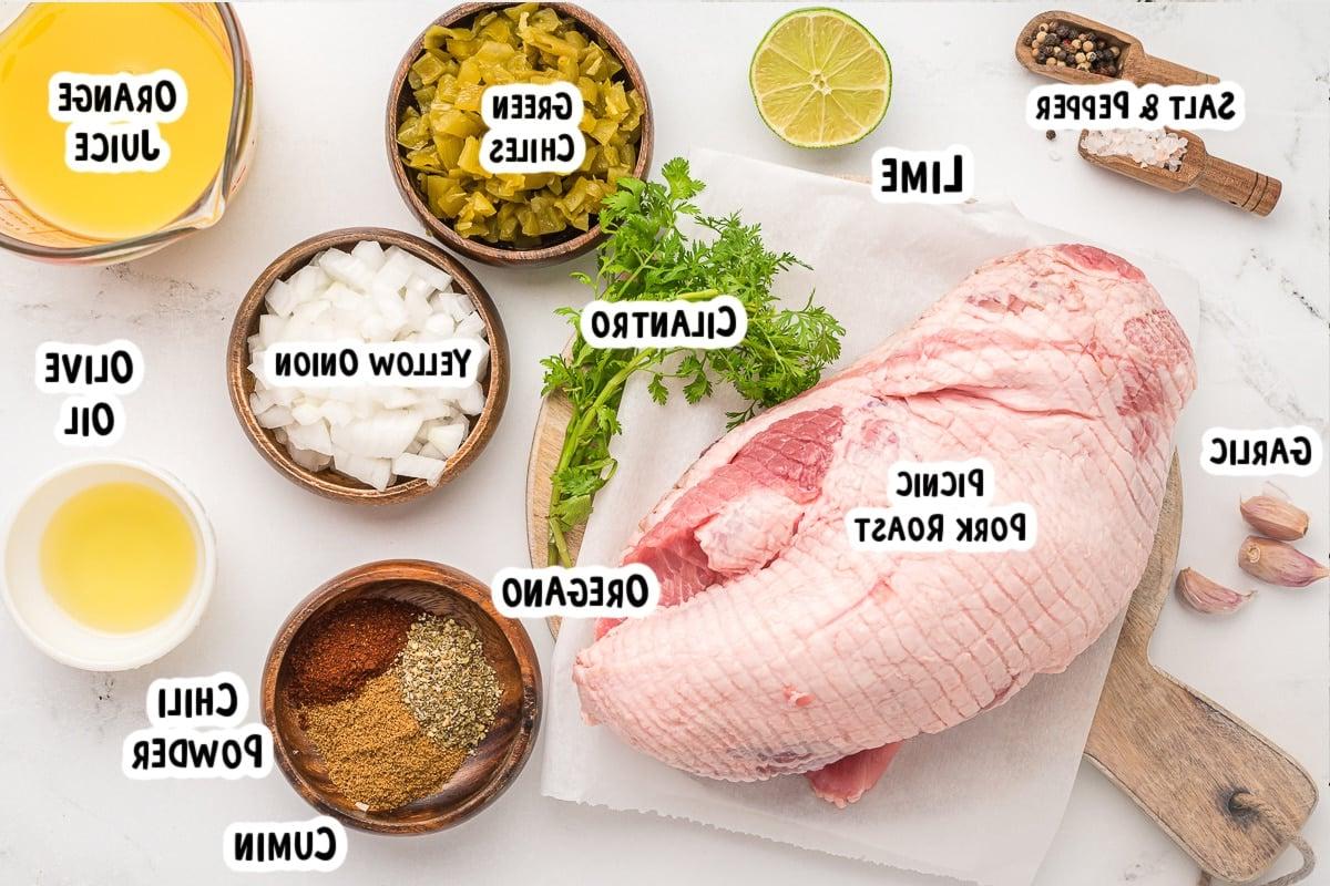 Carnitas nella Pentola a Cottura Lenta 3 ingredients for carnitas on a table.