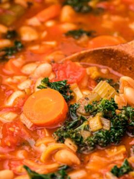 Zuppa Ribollita a cottura lenta 8 close up of ribollita soup with kale.