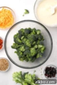 A large bowl of broccoli florets, perfectly prepped for making the creamy broccoli salad.