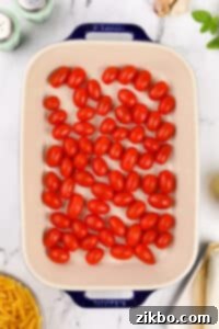 Cherry tomatoes in a baking dish.