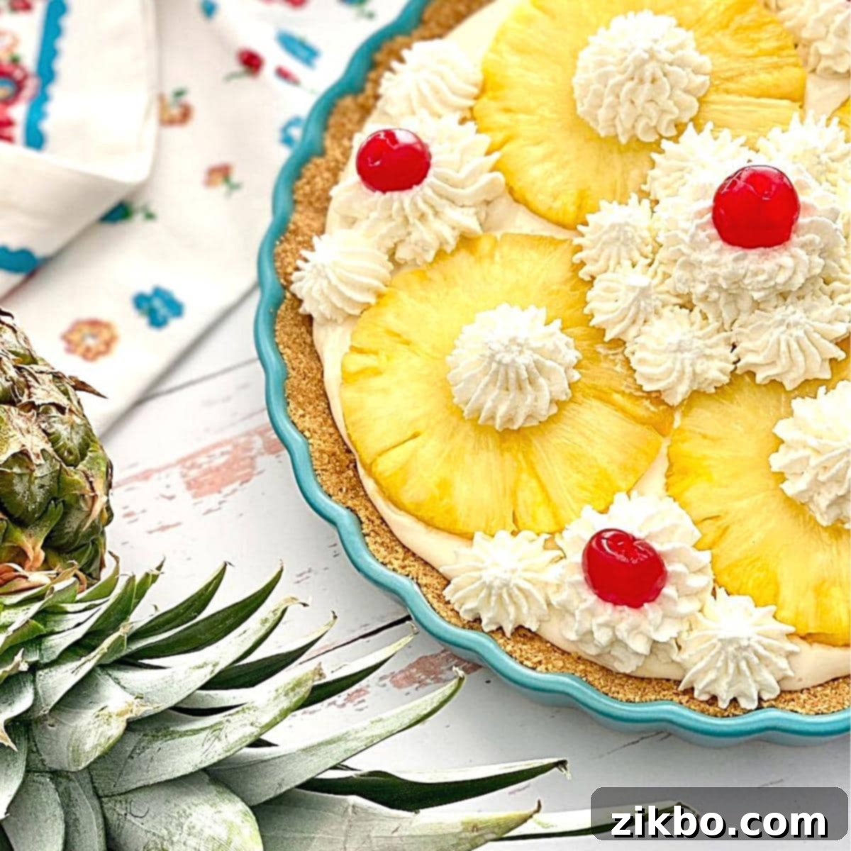 Pretty no-bake pineapple pie with vintage flavors, including maraschino cherries