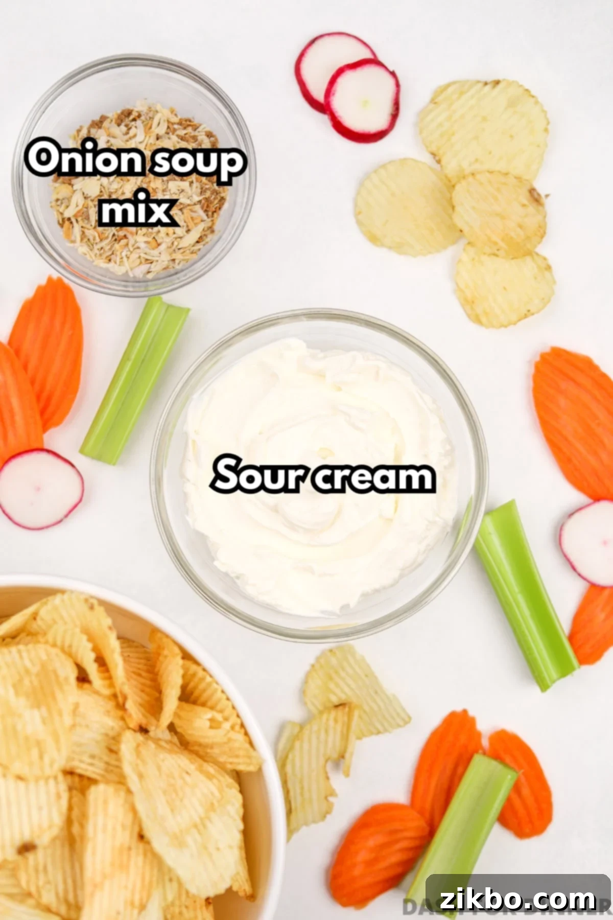 The two essential ingredients for making classic French onion dip: a container of sour cream and a packet of dry onion soup mix.