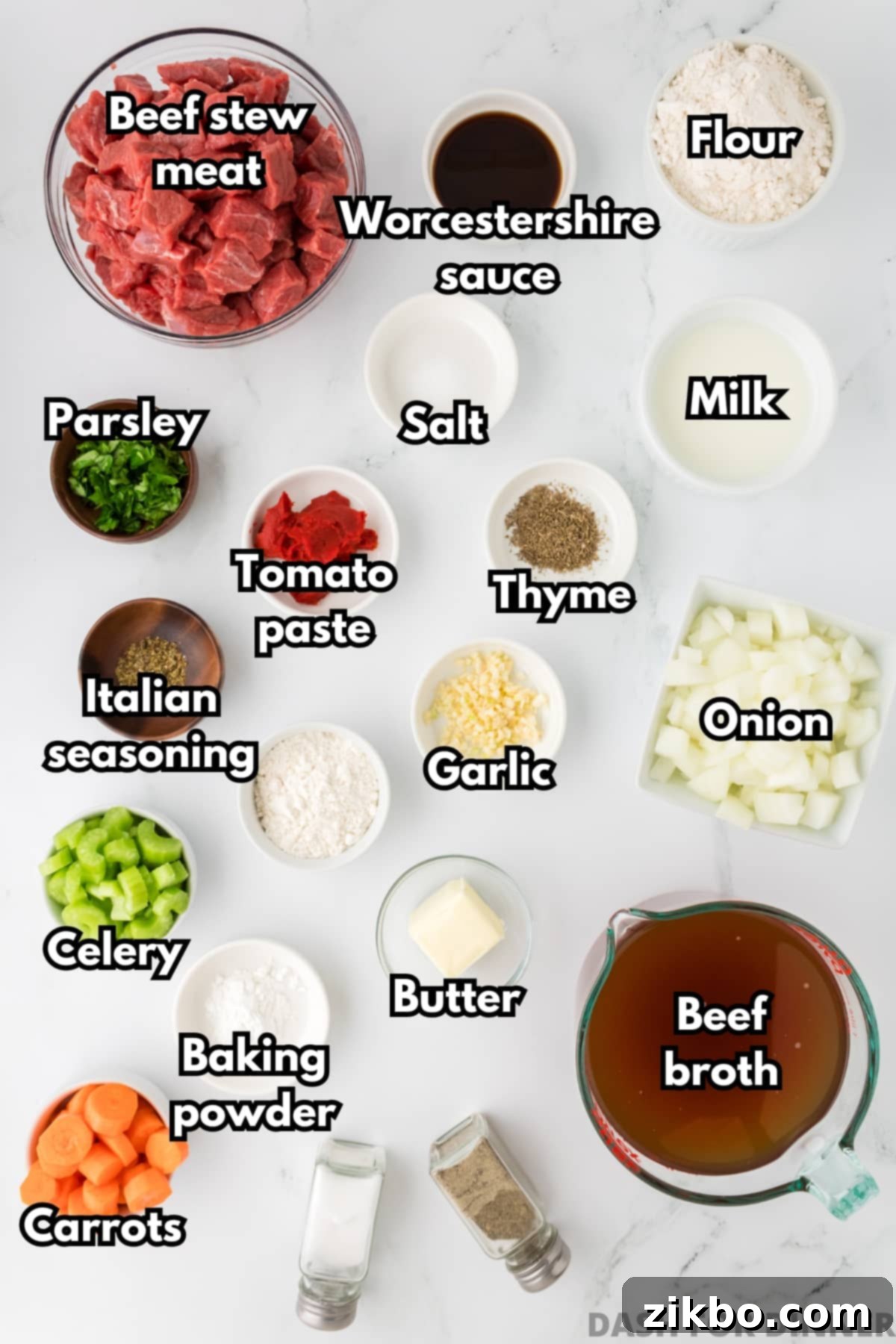 Hearty Slow Cooker Beef Stew with Tender Dumplings 3 The ingredients needed to make beef stew, including stew meat, beef broth, carrots, flour, celery, and carrots.