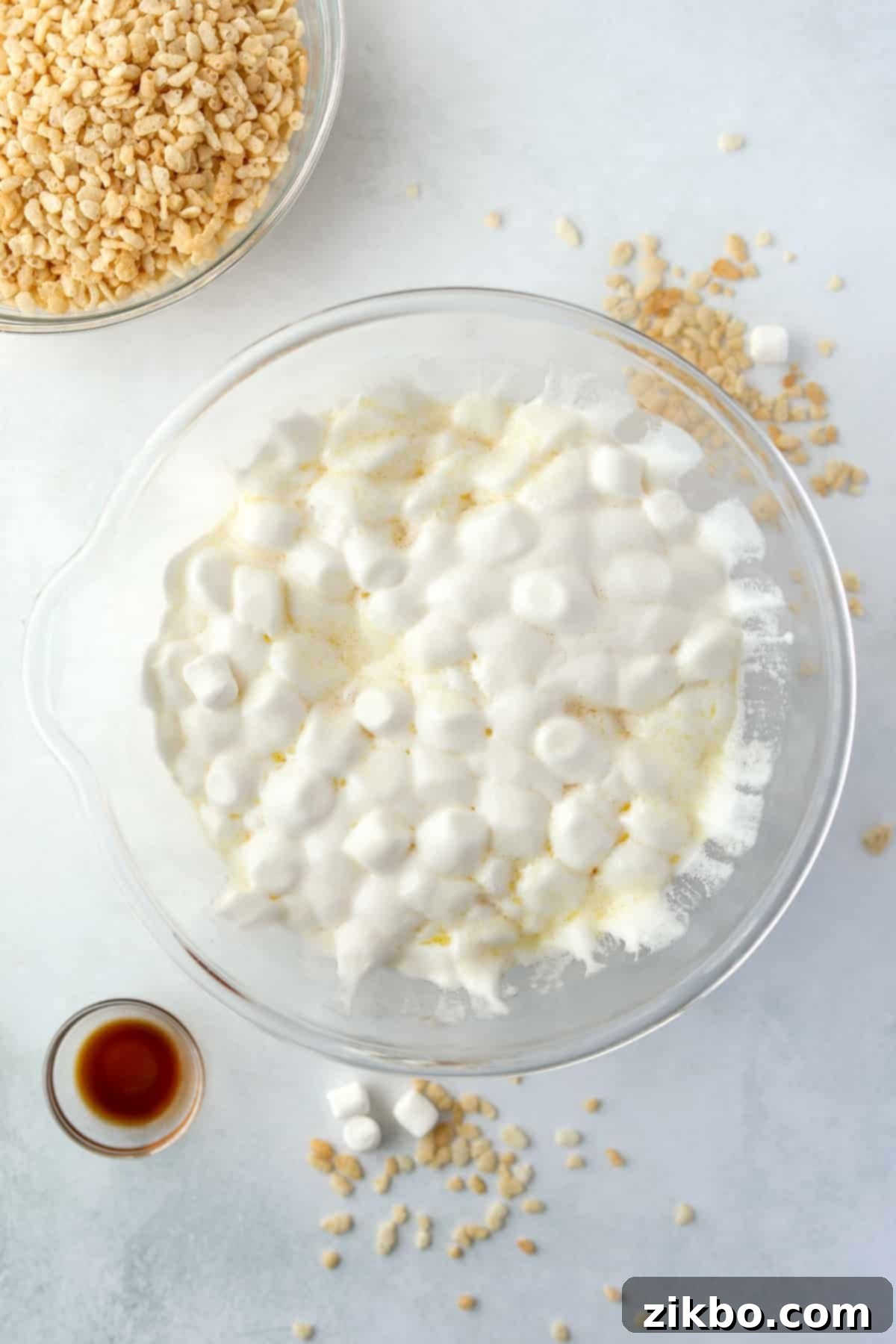 Crispy Sweet Squares 5 A bowl containing a creamy, melted mixture of marshmallows and butter, smooth and ready for the next step.