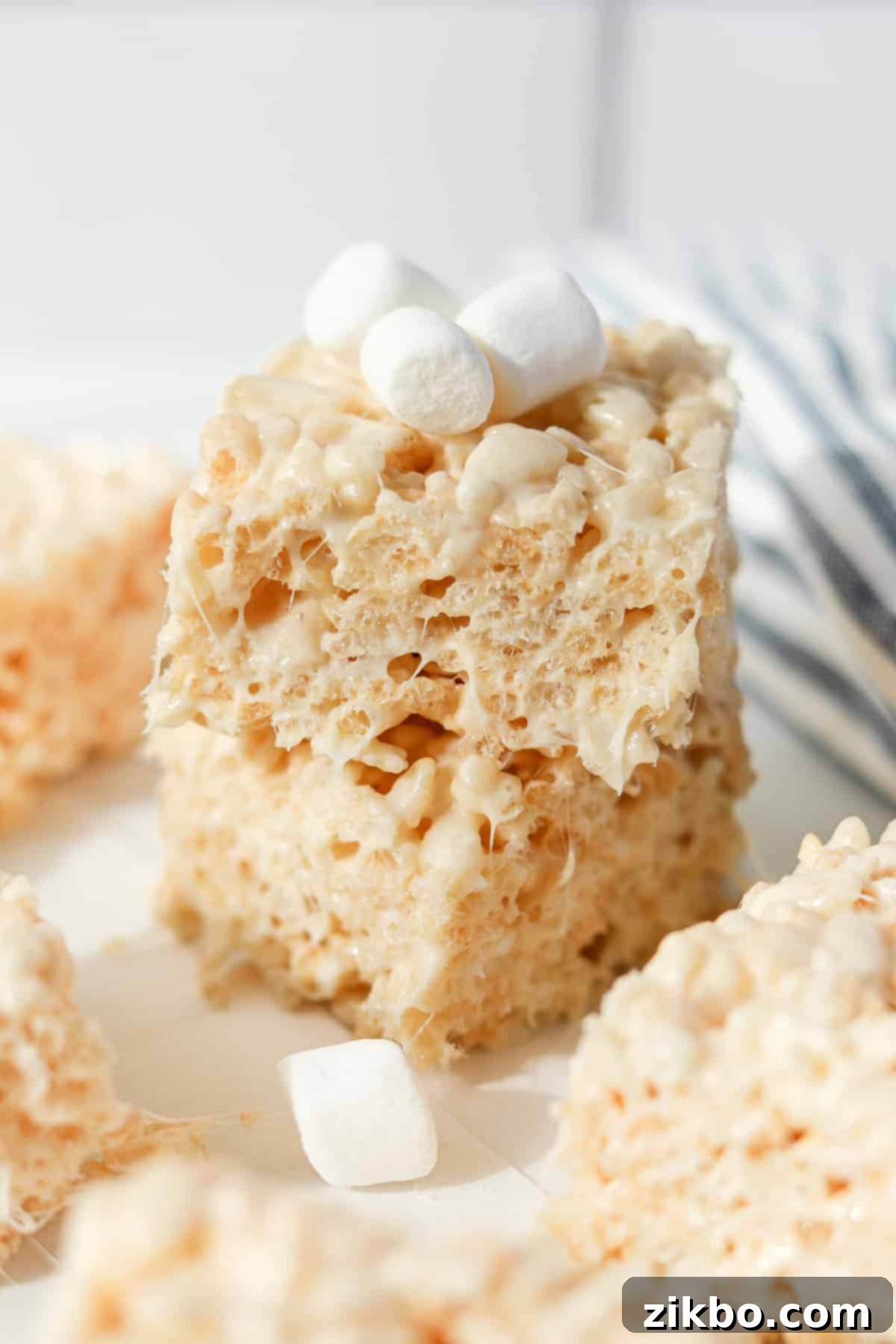 Your Little Krispie Fix 6 Two mini rice krispies treats stacked on top of each other and topped with mini marshmallows.