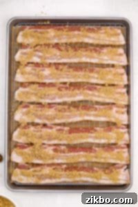 Bacon strips covered with brown sugar.