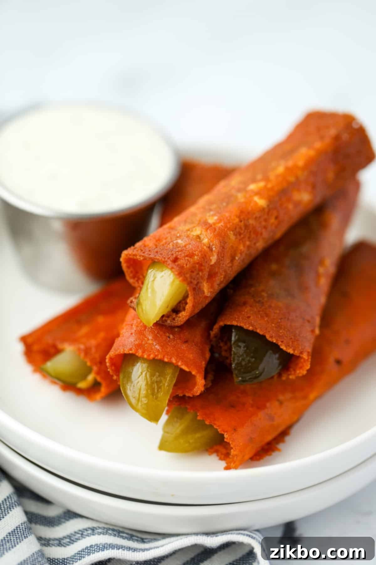 A stack of cheesy pickles.