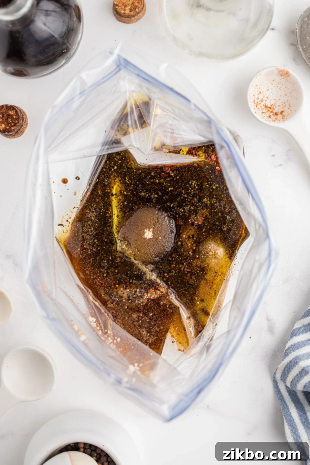 Step 1: Combining all the marinade ingredients in a large bowl, ready to be whisked.