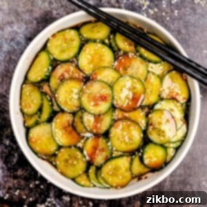 Fiery Fresh Cucumber Crunch 9 A bowl of cucumber salad glazed with a spicy dressing.