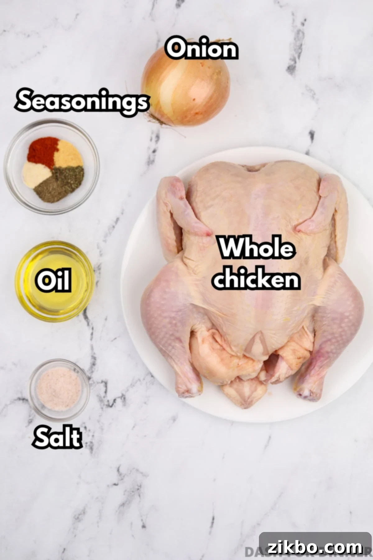 A raw whole chicken prepared for roasting, surrounded by small bowls containing avocado oil, various spices, and sea salt, all key ingredients for a flavorful roast.
