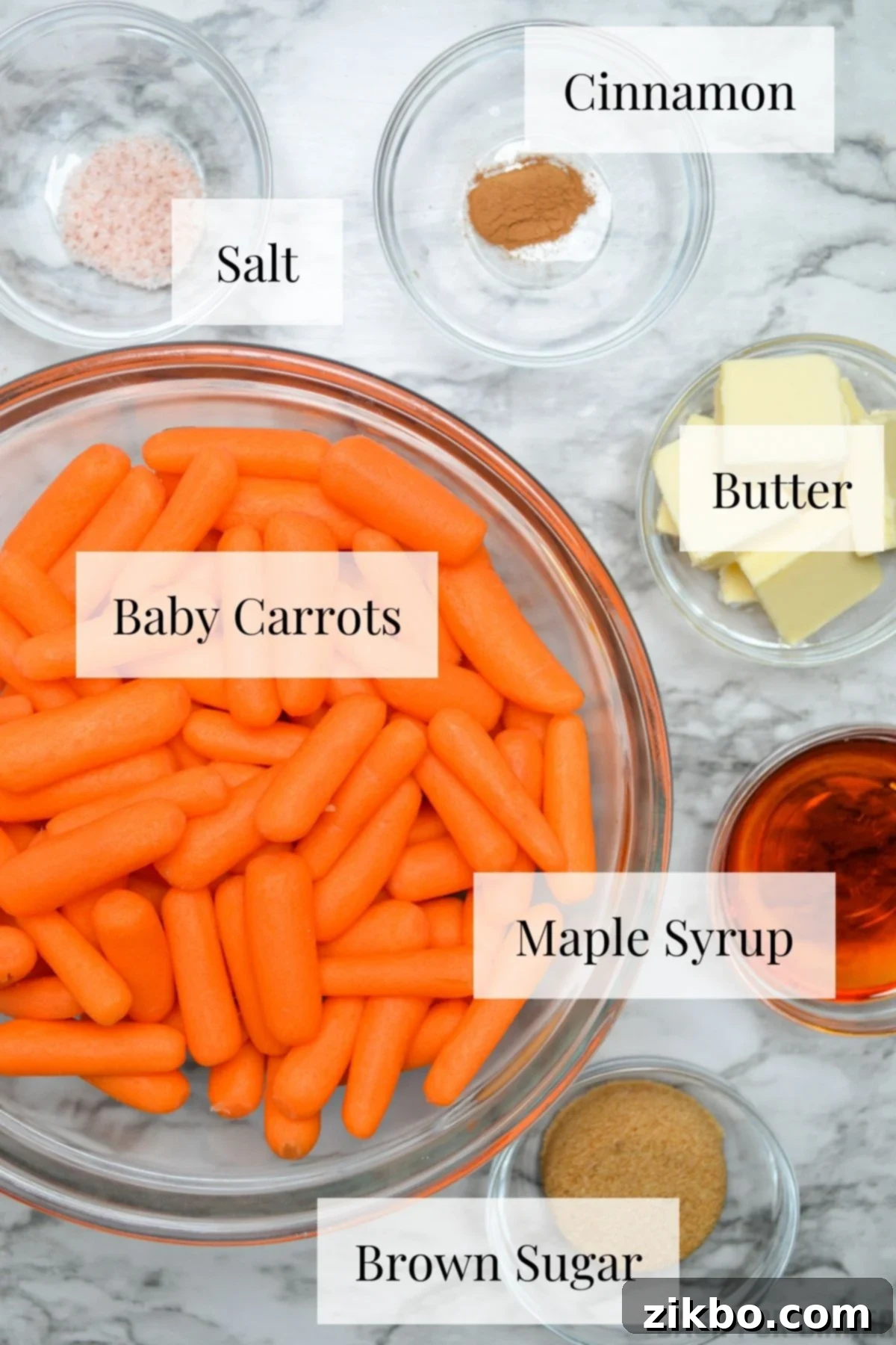 The ingredients needed to make slow cooker maple and brown sugar glazed carrots.