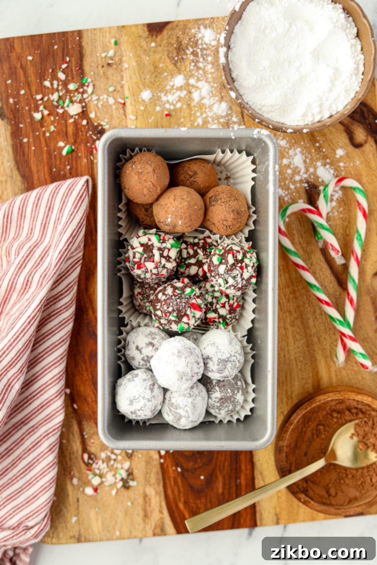 A loaf pan filled with peppermint truffles.