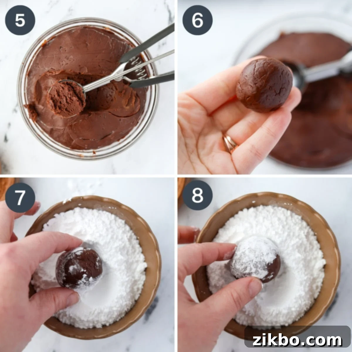 Hands rolling a ball of chocolate mixture in a bowl of powdered sugar until fully coated.
