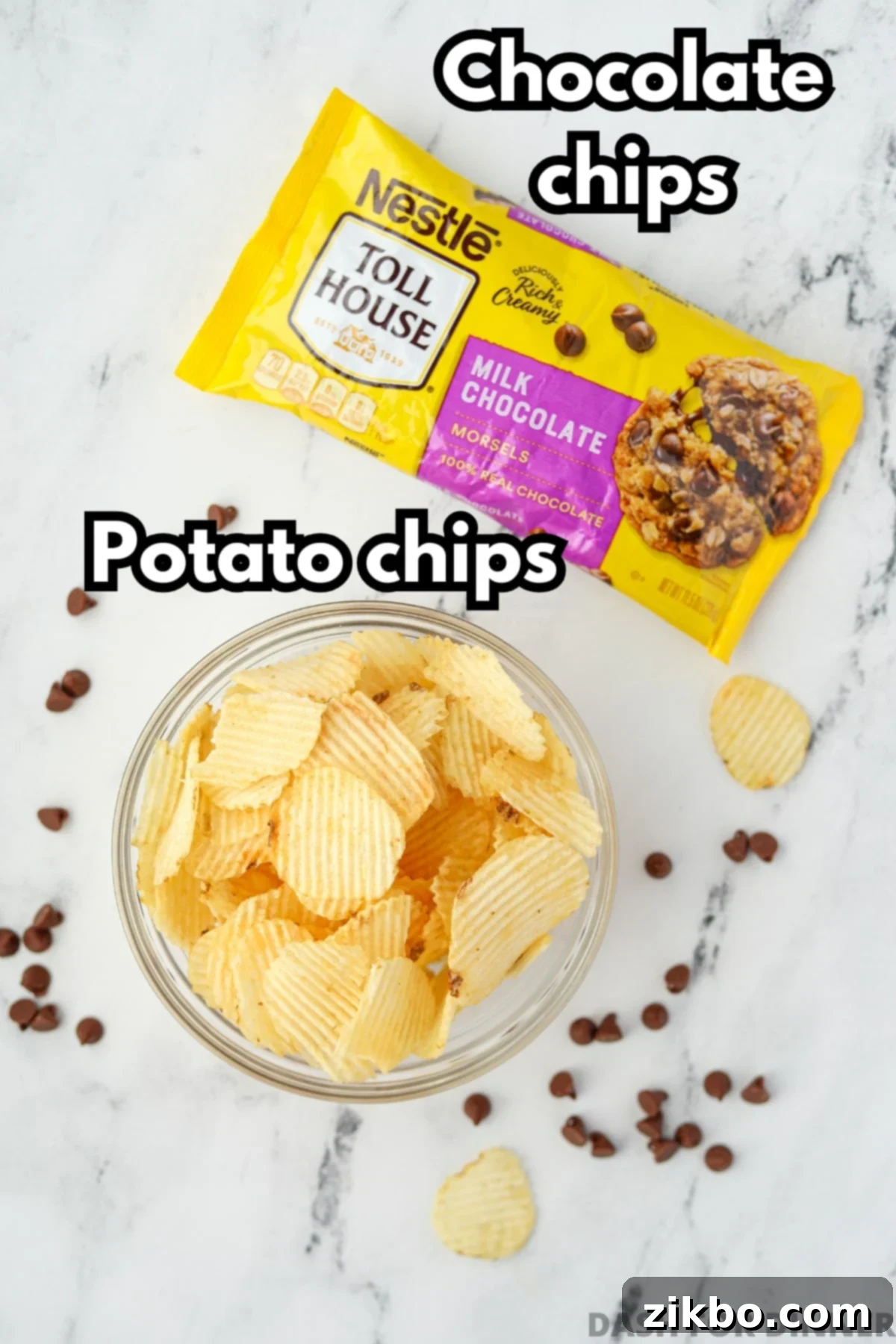 A bag of chocolate chips and a bowl of potato chips on a white marble surface, ready for making bark.