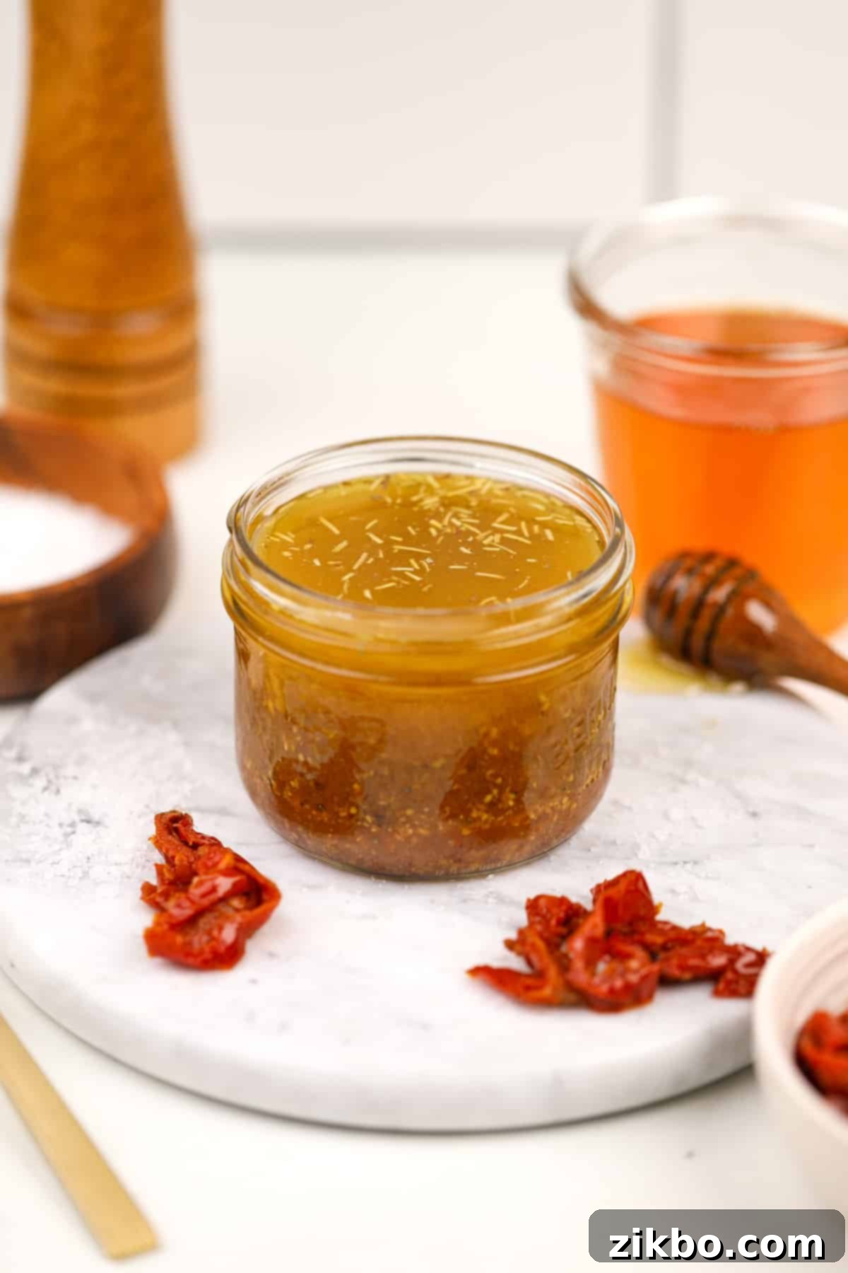 A mason jar filled with homemade dressing.