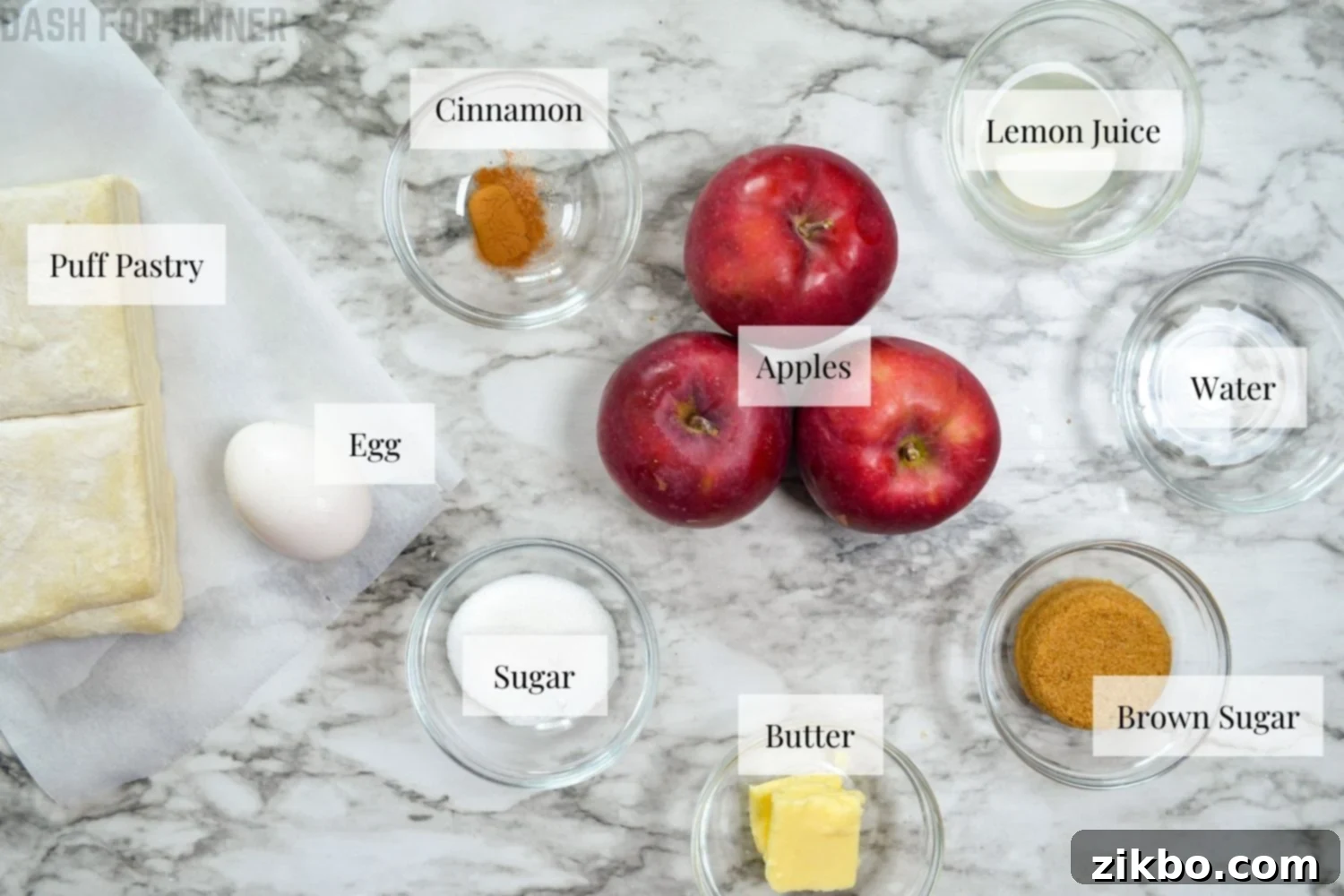 All the fresh ingredients meticulously laid out to make delicious apple turnovers in an air fryer.