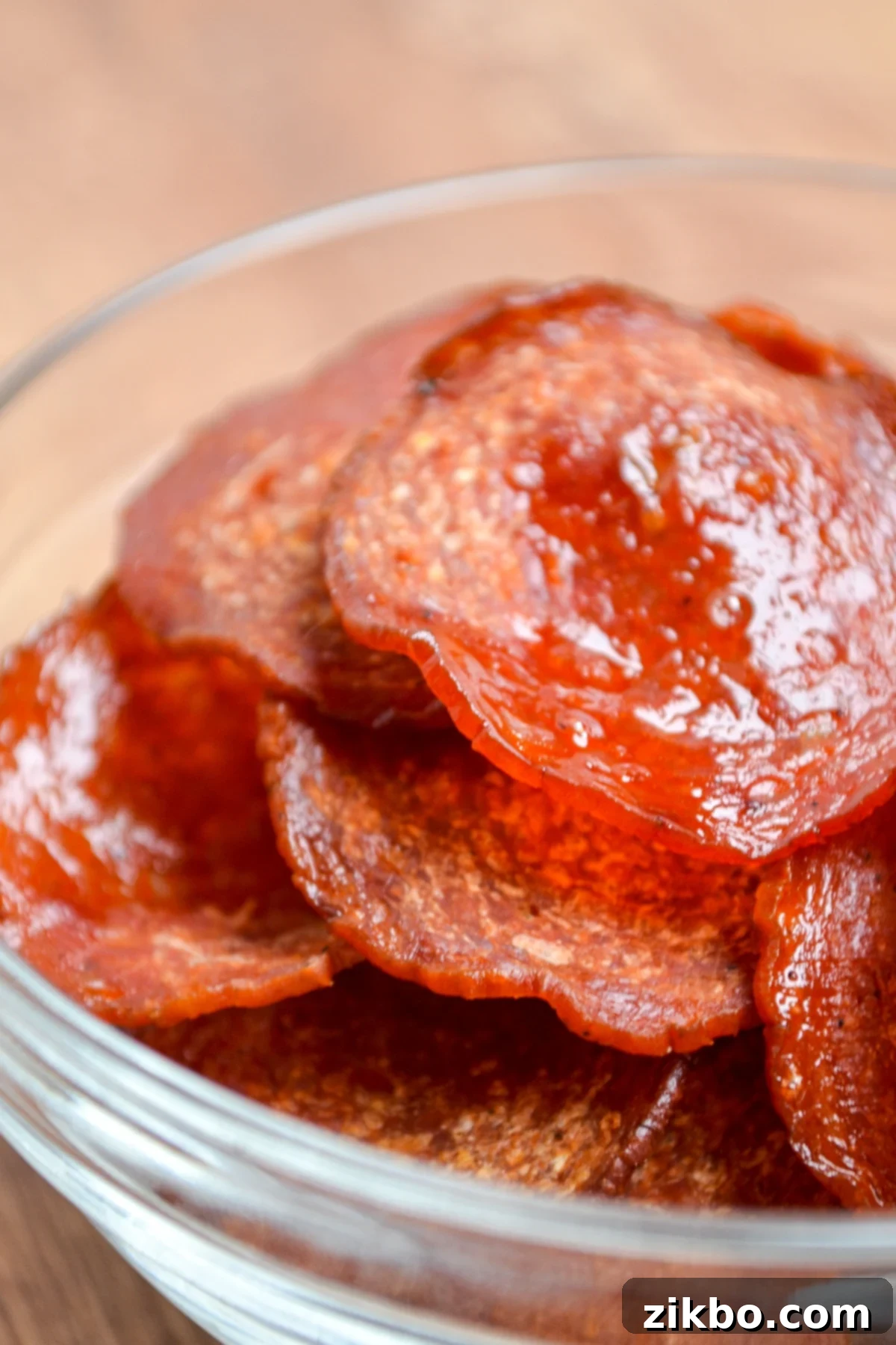 Air fryer pepperoni chips in a small snack bowl.