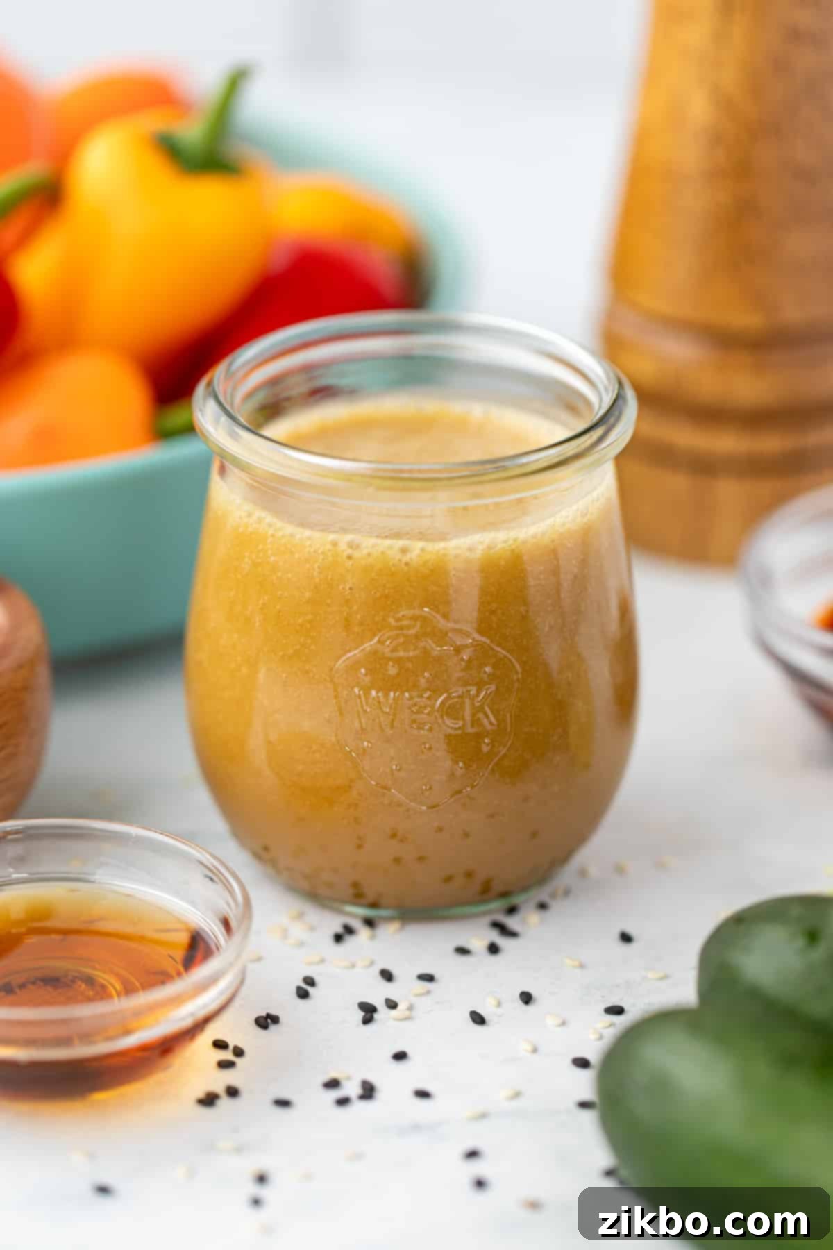 Sesame Ginger Dressing 7 A charming small glass jar, ready for storage or serving, now filled with the freshly prepared ginger sesame dressing.
