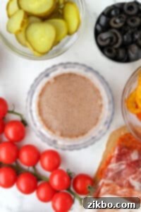 A small jar blender filled with creamy Italian sub dressing.
