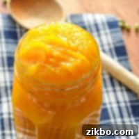 A jar of homemade pumpkin puree.