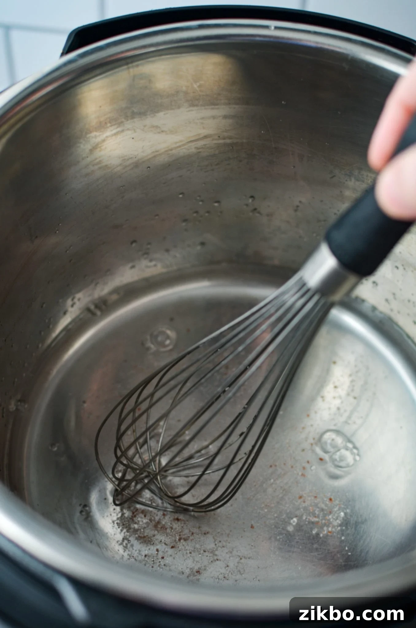 Whisking salt into water in an Instant POt.