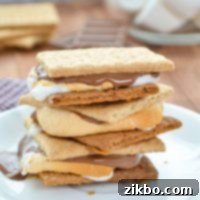 A stack of S'mores on a plate.