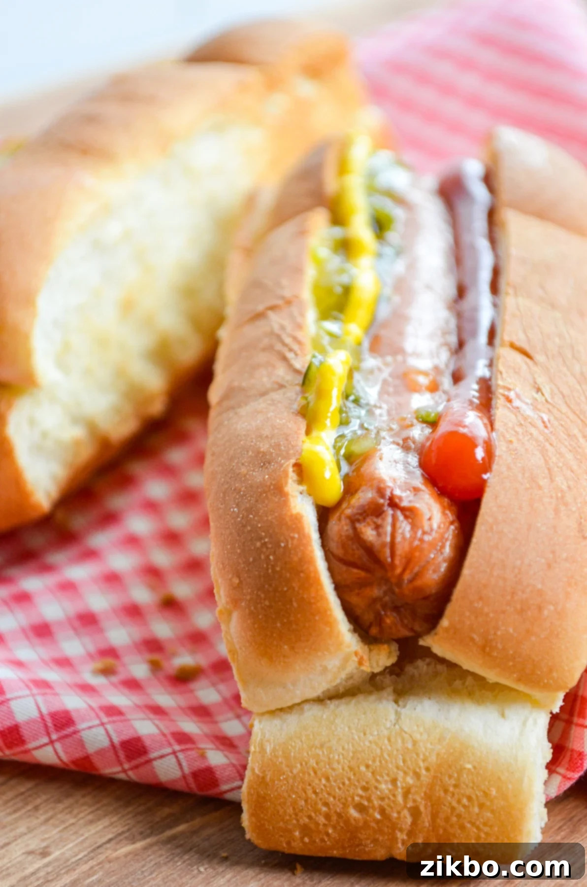 A classic hot dog prepared with ketchup, mustard, and relish.
