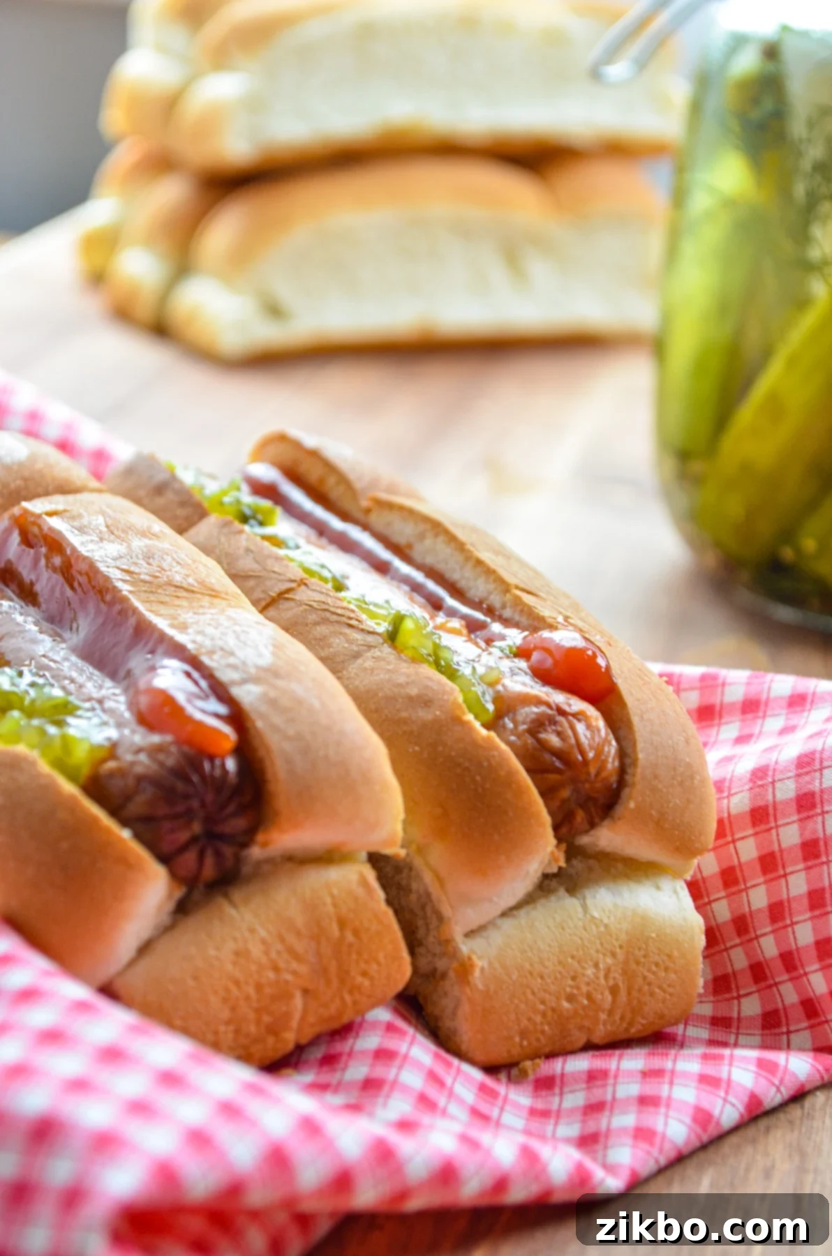 Hot dogs, prepared with toasted buns and classic toppings.