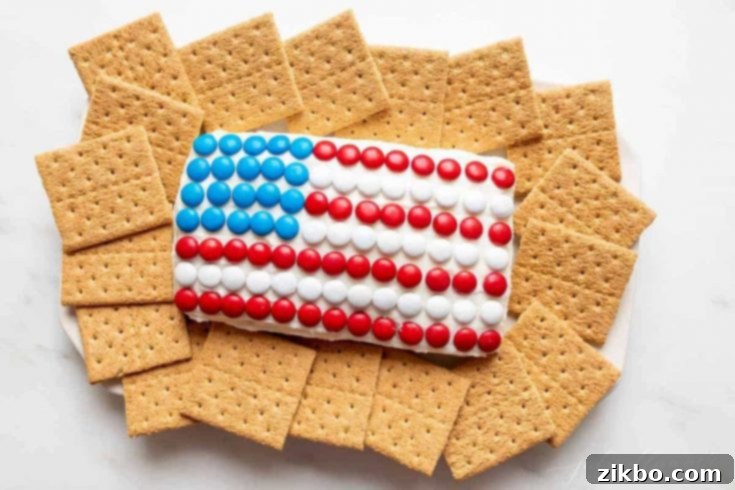 Funfetti Flag 4th of July Cheese Ball Dessert, designed as an American flag, perfect for dipping with crackers or cookies.