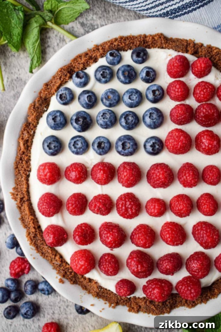Easy and adorable 4th of July No-Bake Pie, showcasing red, white, and blue layers for a festive dessert.