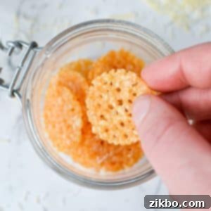 Savory Parmesan Snaps 11 A jar with parmesan crisps inside.