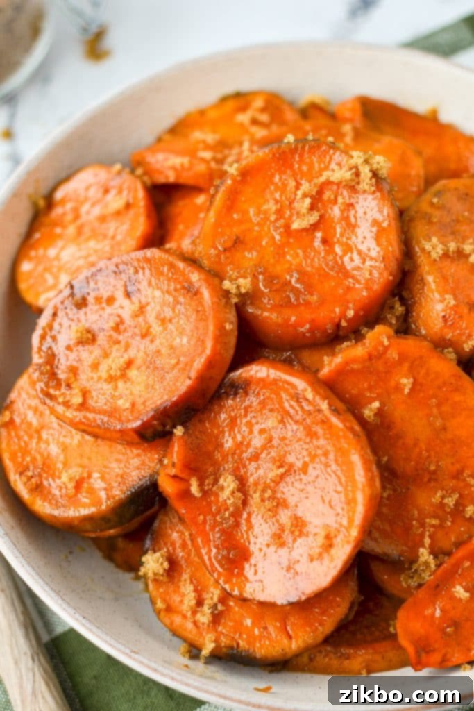 A shallow bowl with sliced sweet potatoes.