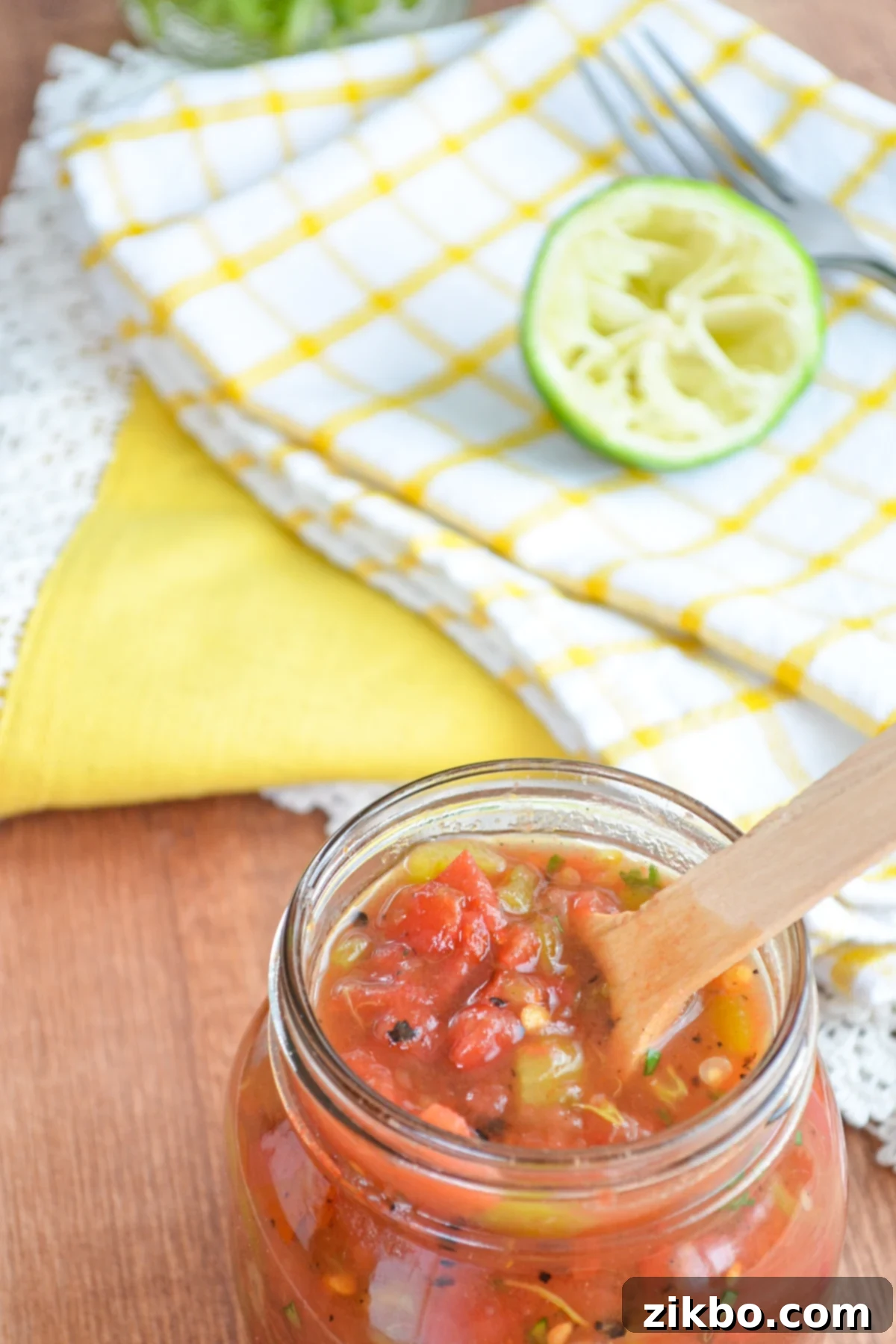 A jar of homemade tomatoes and green chilies. A great substitute for Rotel.