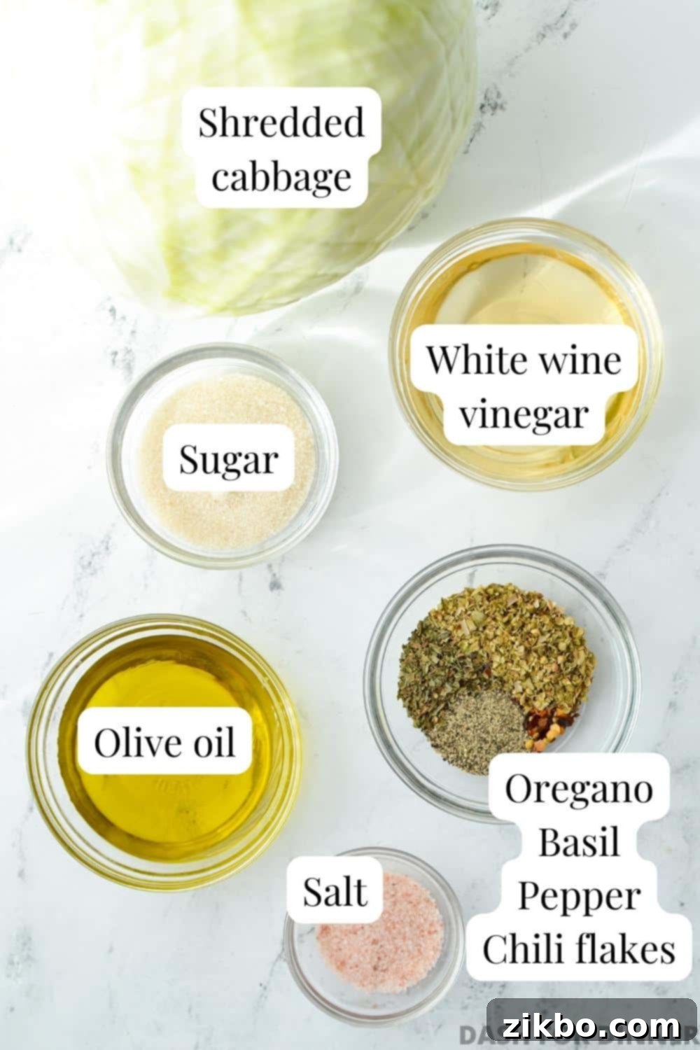 The ingredients needed to make a swedish pizza salad: vinegar, oil, seasons, salt, and sugar.