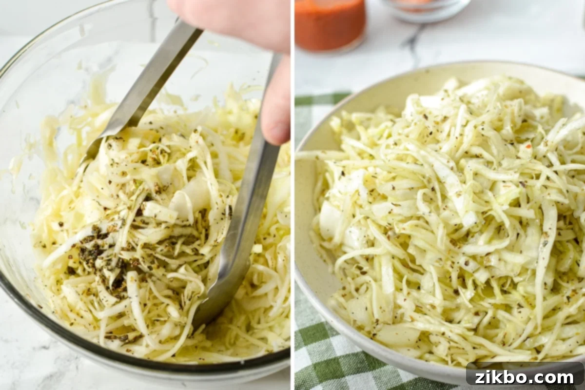 Tossing shredded cabbage with dressing.
