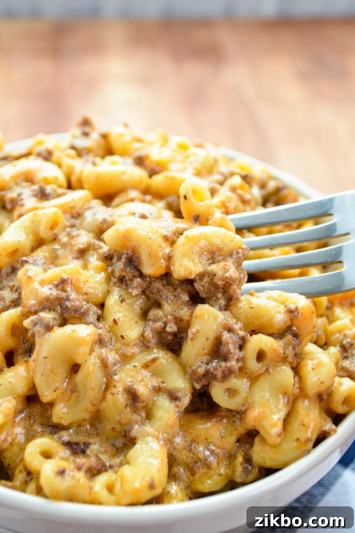 A big bowl of Instant Pot Hamburger helper, rich with cheesy macaroni and ground beef.