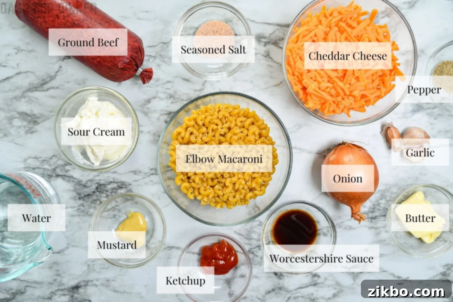 Ingredients needed to make Instant Pot Hamburger Helper including ground beef, macaroni, cheese, and vegetables.