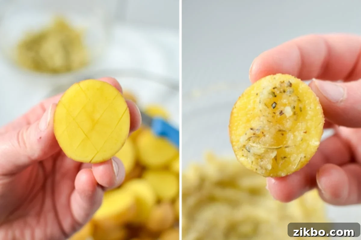 Crispy Parmesan Potatoes 5 A baby potato with a crosshatch pattern on its cut side, covered in a parmesan and butter paste.