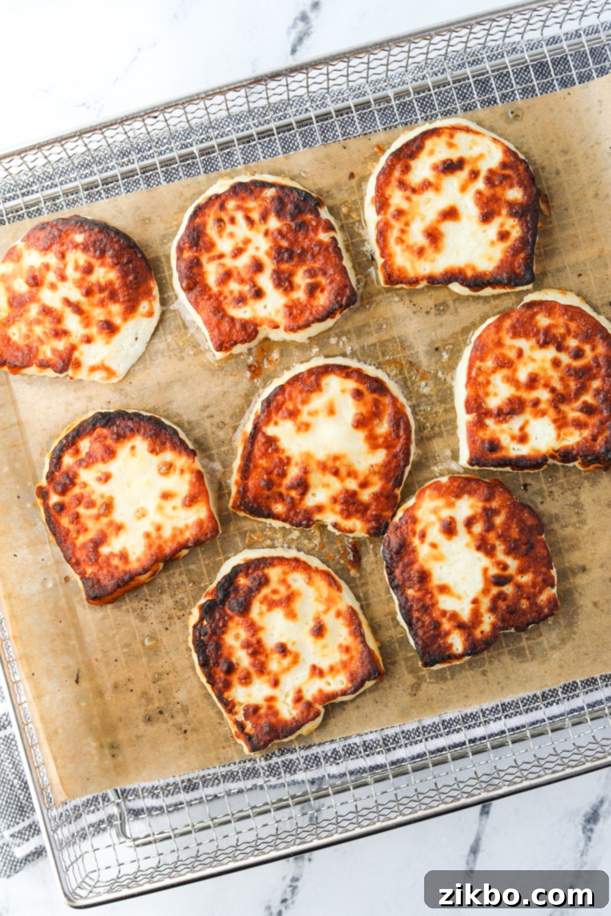 Slices of halloumi cheese that have been air fried to a golden brown perfection.