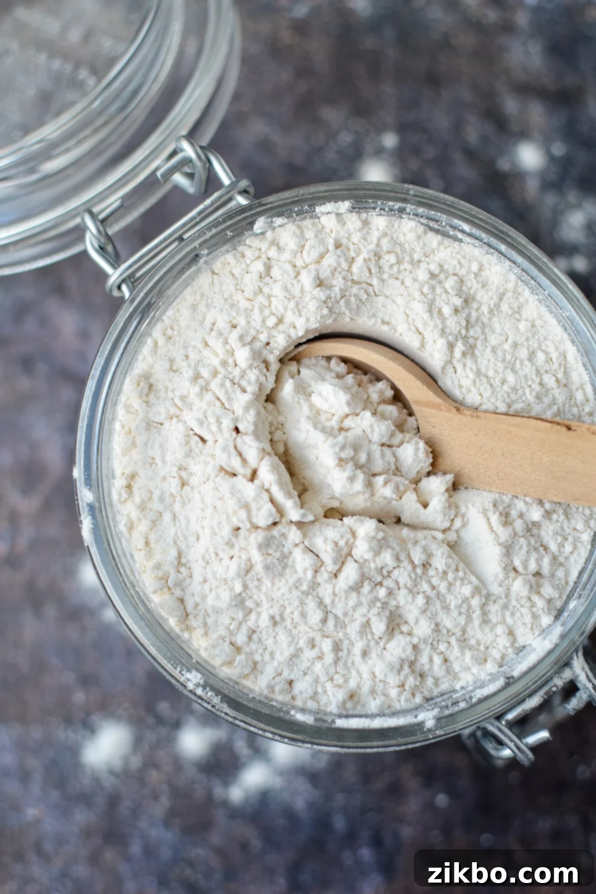 A small jar of homemade self rising flour, ready for baking.