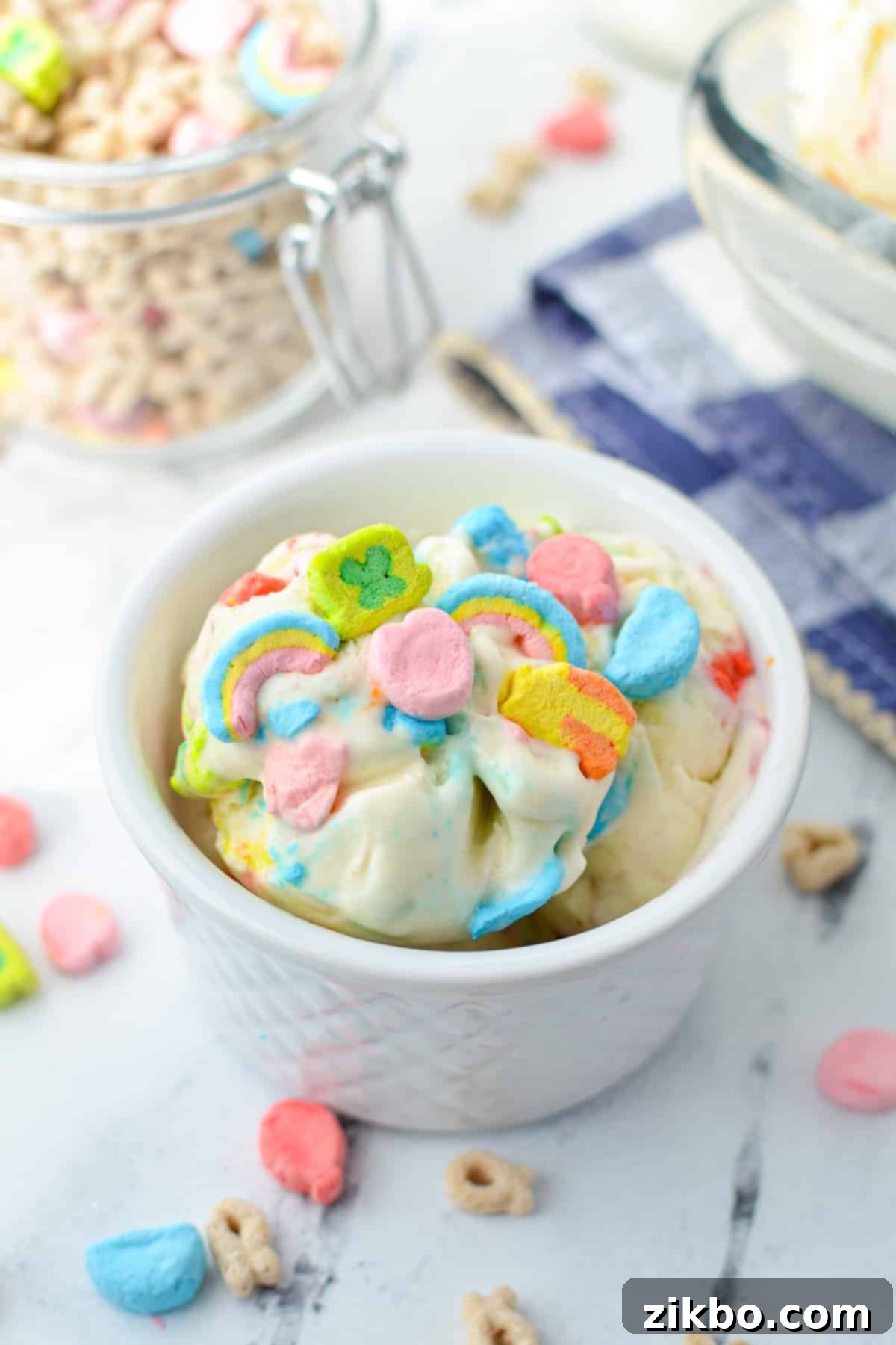 A small bowl of lucky charms ice cream with marshmallows, ready to be enjoyed.