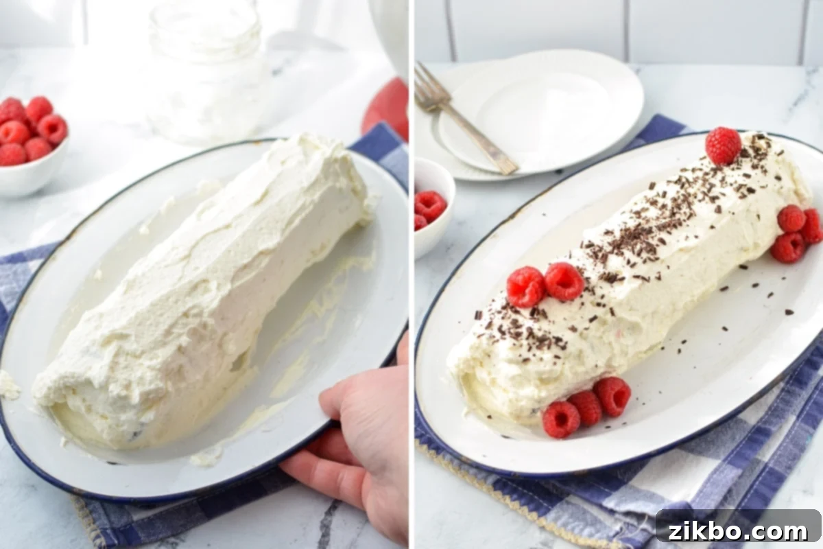 A finished chocolate wafer and whipped cream log cake, fully covered in cream and ready for garnishing with berries and chocolate shavings.