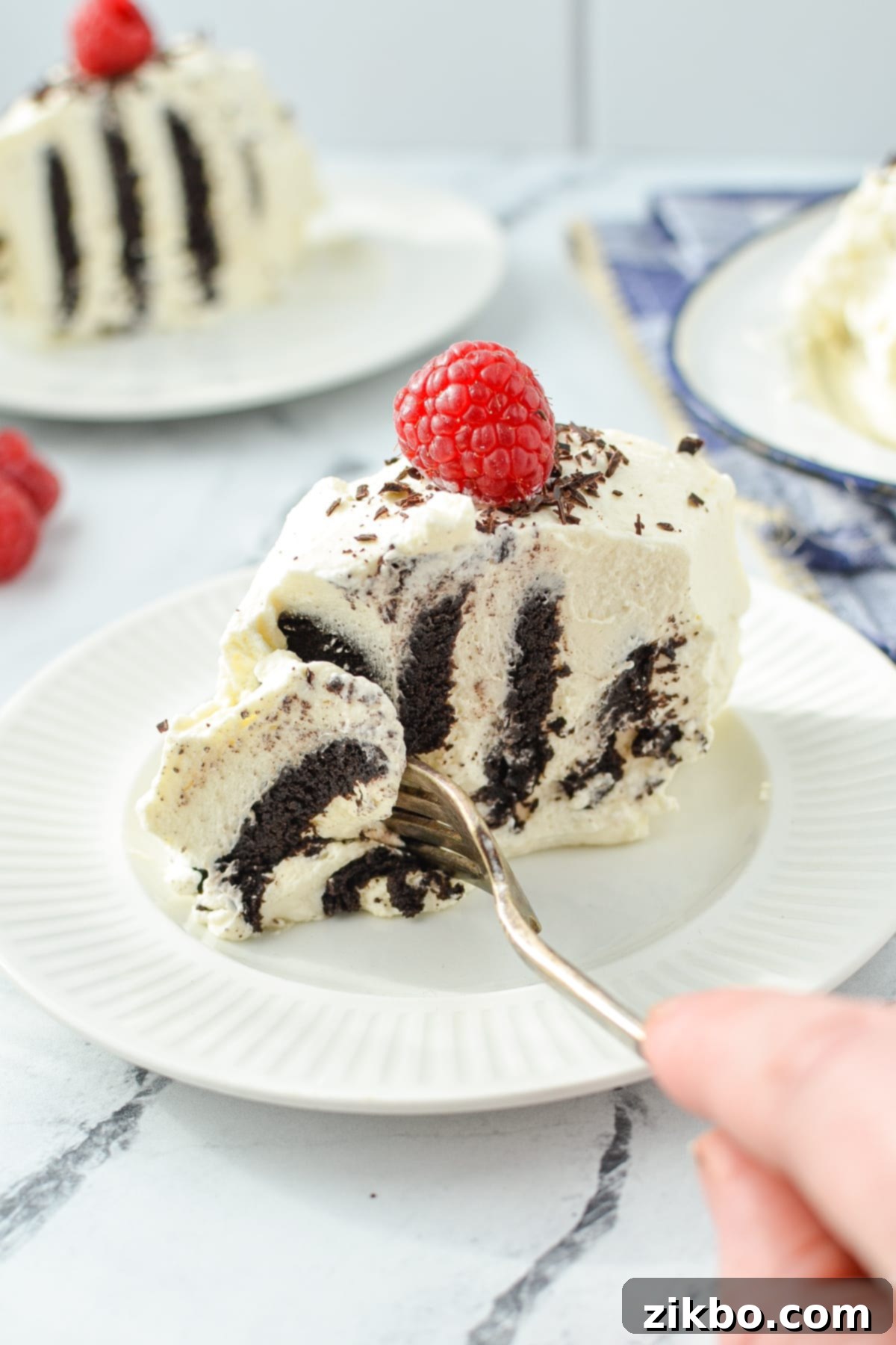 A fork taking a portion of the delicious Zebra Cake, highlighting its soft, cake-like texture.
