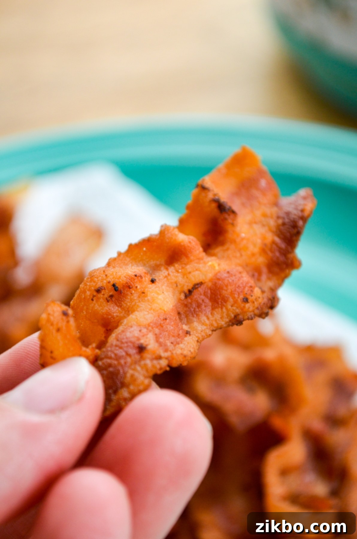 Crispy bacon slices cooked in an Instant Pot, ready to eat.