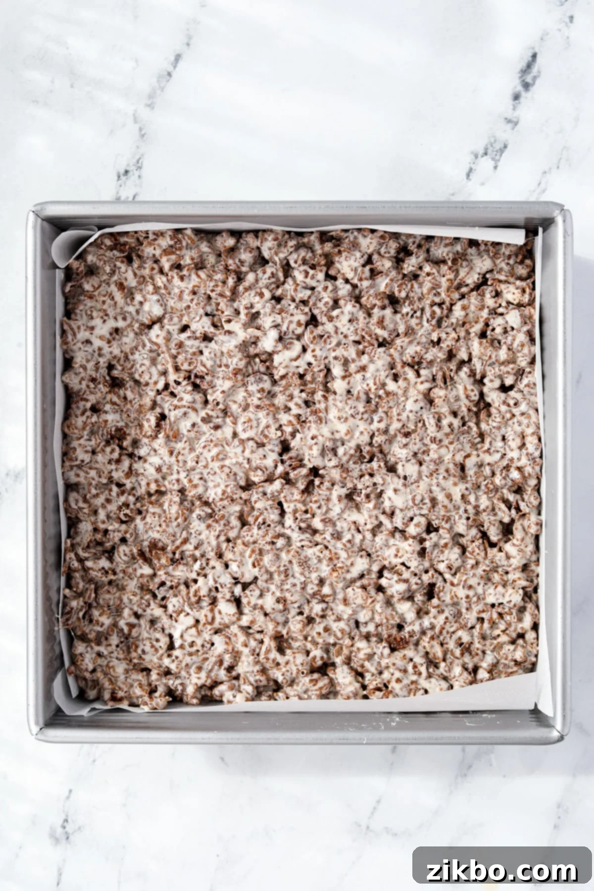 A pan filled with a cereal treat mixture.