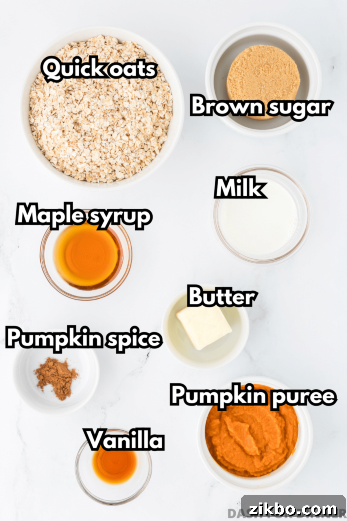 Spiced Pumpkin No-Bake Bites 3 All the necessary ingredients laid out for making pumpkin no-bake cookies: quick oats, brown sugar, milk, butter, maple syrup, pumpkin puree, a mix of fall spices, and vanilla extract.