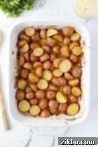 A baking dish with roasted baby potatoes.
