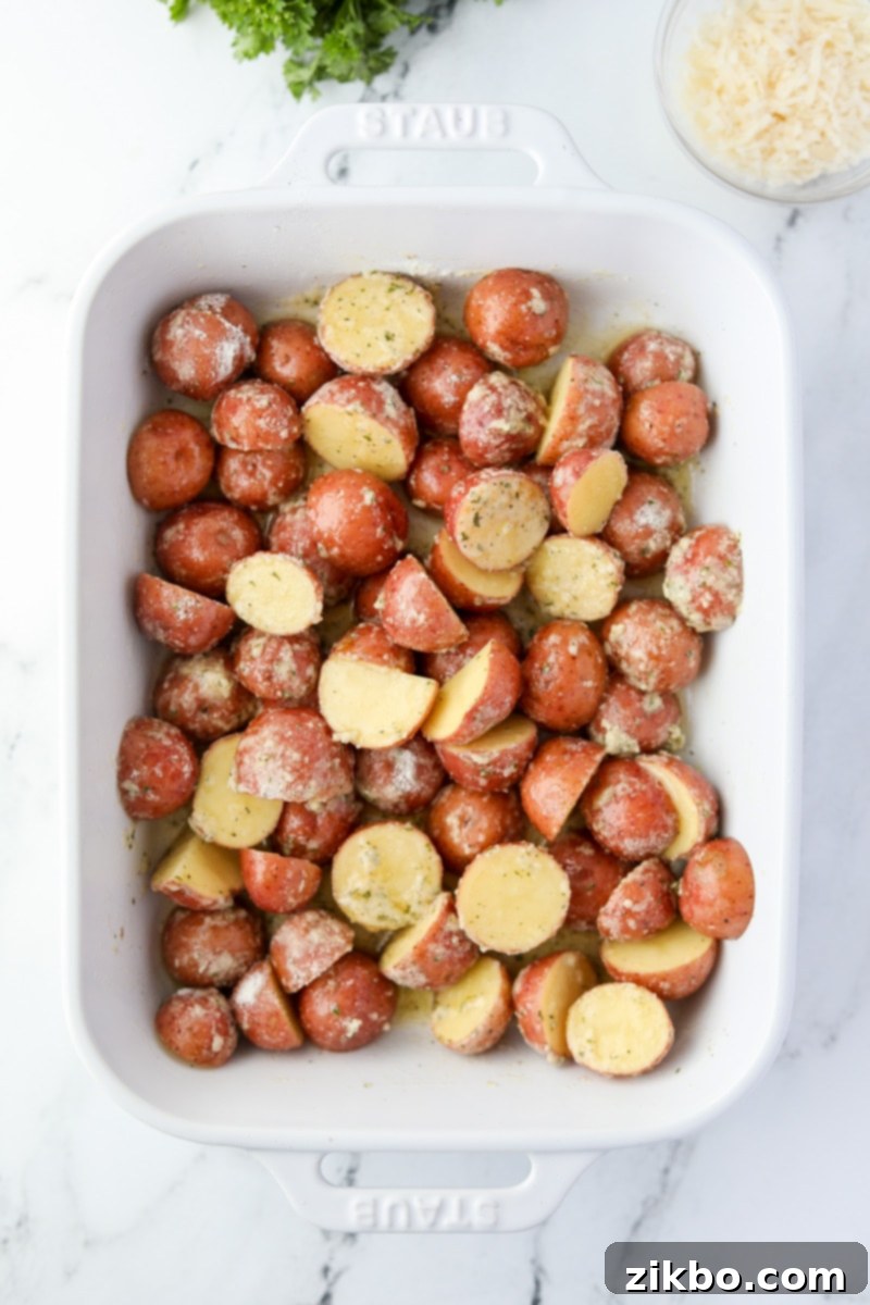 Halved potatoes tossed in ranch seasoning.